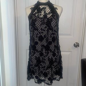 Free People crochet dress with lining.